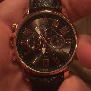 Men’s copper and black watch